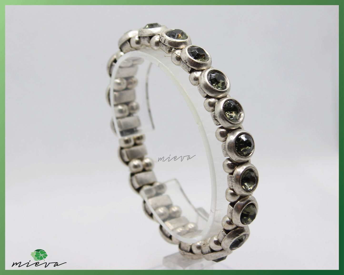 Classic Silver Eternity Bracelet with Dark Green Gemstones