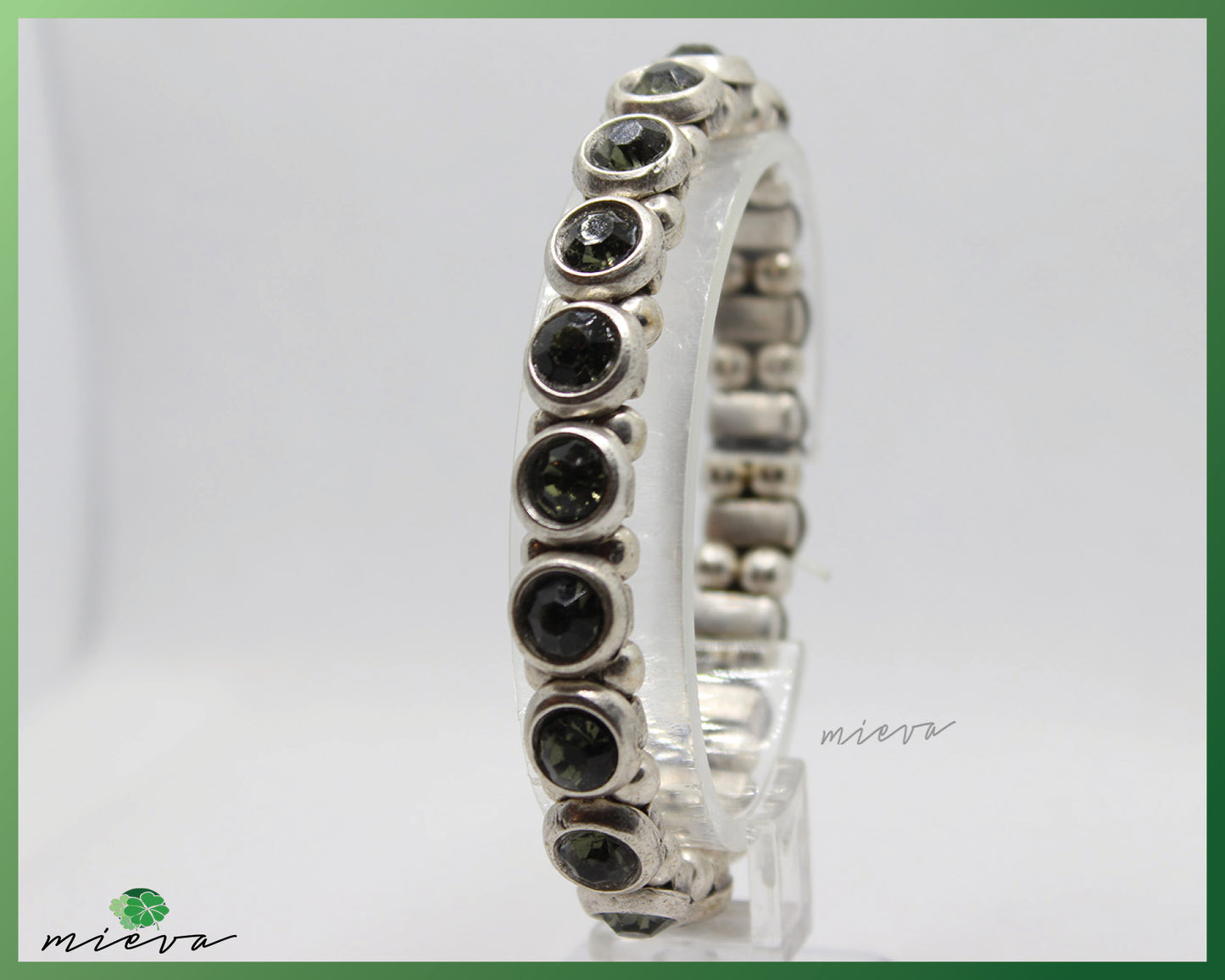 Classic Silver Eternity Bracelet with Dark Green Gemstones