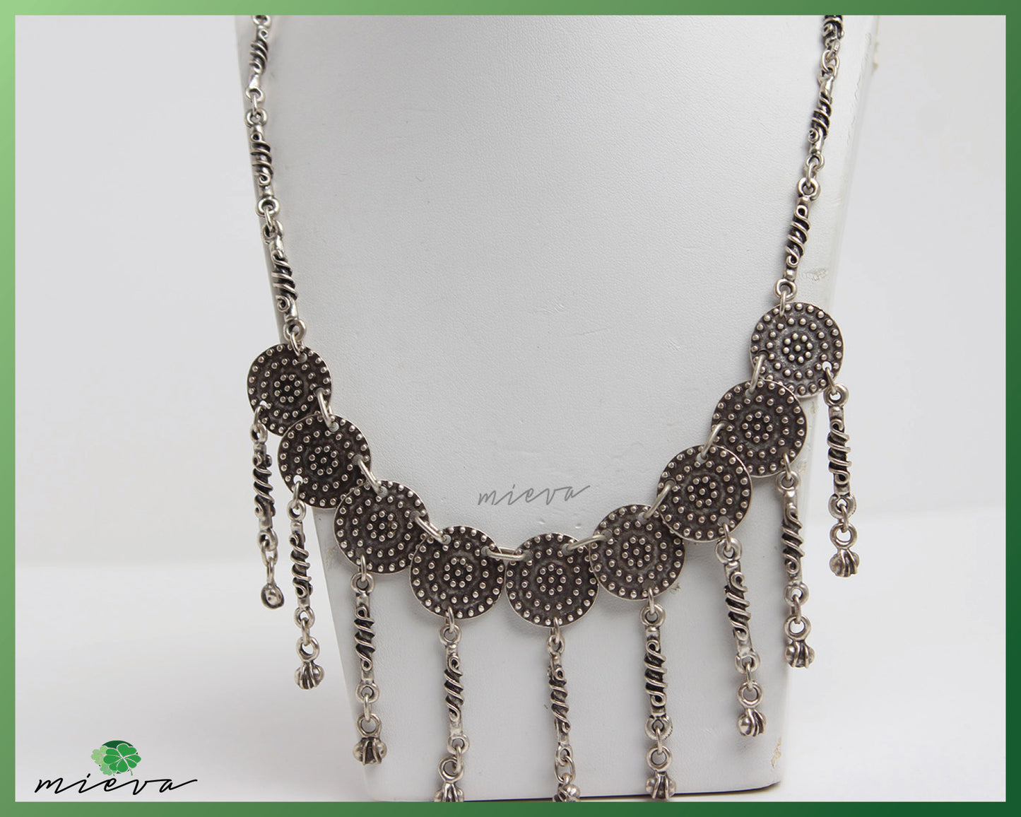 Bohemian Elegance Silver Medallion Necklace with Charms