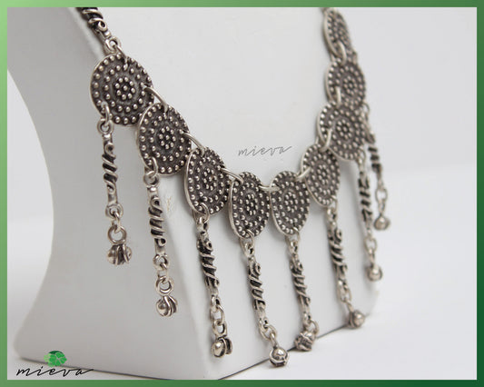 Bohemian Elegance Silver Medallion Necklace with Charms