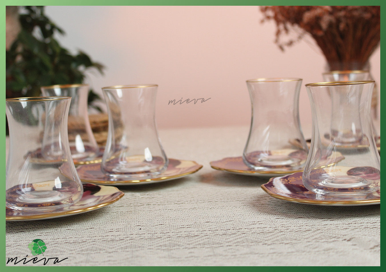 Elegant Vintage Tea Set with Golden Trim and Portrait Saucers